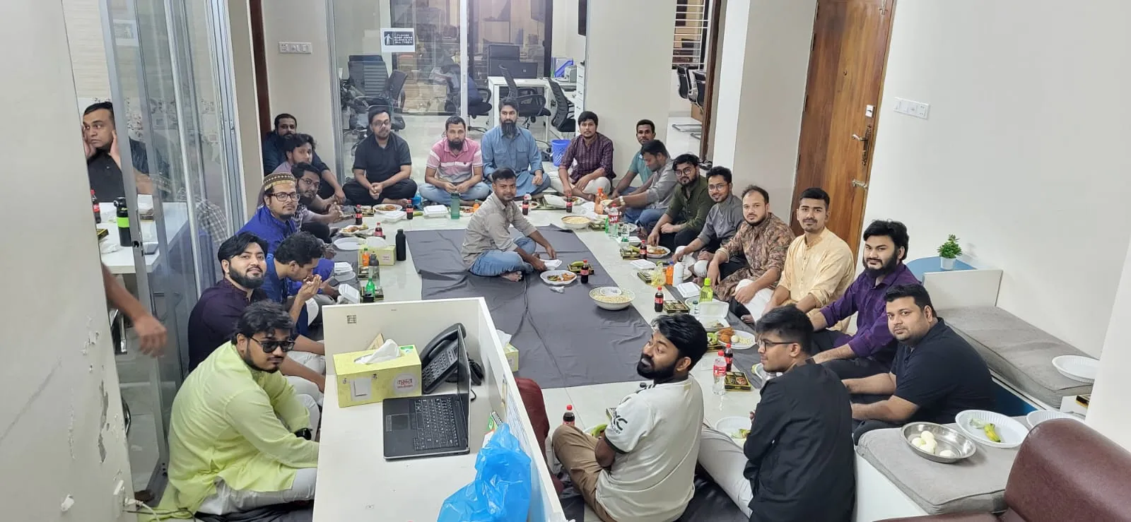 Team posing together at the office